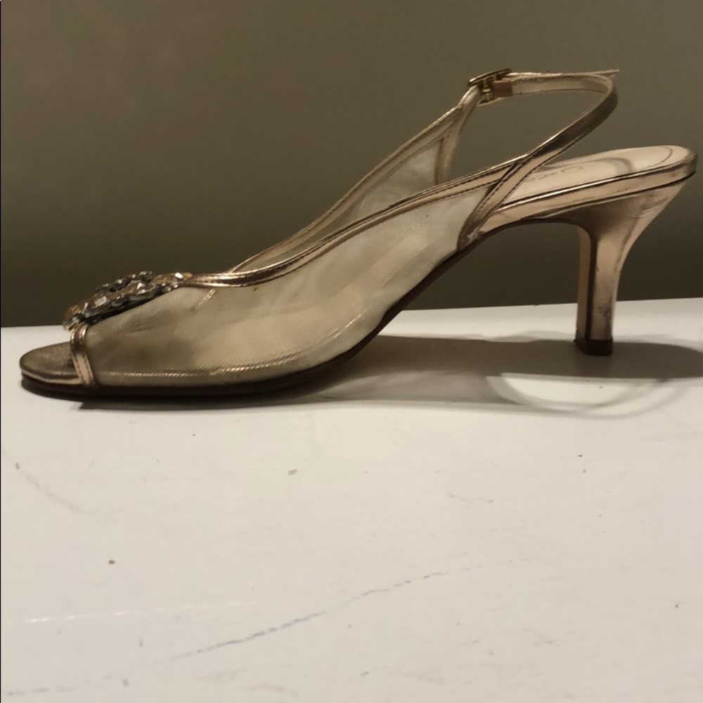 Gold heels with gem decoration